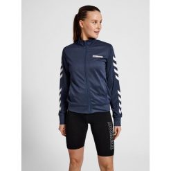 Damska bluza dresowa zapinana na zamek Hummel Legacy. Niebieskie bluzy sportowe damskie Hummel, s, bez wzorów, z dresówki, bez kaptura, do piłki ręcznej. Za 187.50 zł.