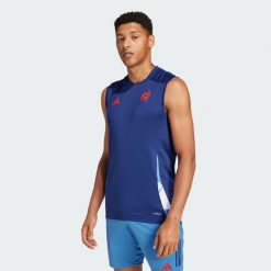 Koszulka France Training Sleeveless. Niebieskie koszulki sportowe męskie Adidas, l, bez wzorów, z materiału, bez kołnierzyka, bez ramiączek. Za 199.00 zł.