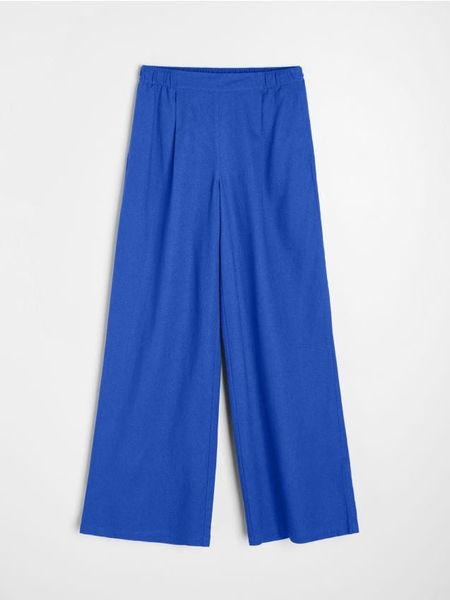 Spodnie culotte z domieszką lnu - niebieski. Niebieskie spodnie materiałowe damskie Sinsay, l, bez wzorów. Za 39.99 zł.