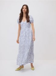 Wzorzysta sukienka maxi - wielobarwny. Sukienki damskie Reserved, l, bez wzorów, z bawełny, bez kołnierzyka, bez ramiączek, maxi, rozkloszowane. W wyprzedaży za 99.99 zł.