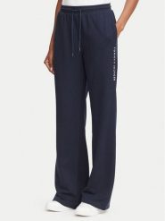 Tommy Hilfiger Spodnie dresowe UW0UW06620 Granatowy Regular Fit. Niebieskie spodnie dresowe damskie Tommy Hilfiger, l, bez wzorów, z bawełny. Za 289.99 zł.