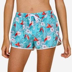 Spodenki surfingowe dla dzieci Olaian 100 Katy Coco. Niebieskie spodenki dla dziewczynek OLAIAN, bez wzorów, z materiału, sportowe. Za 39.99 zł.