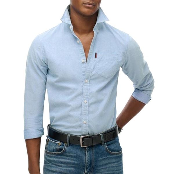 Wyblakana koszula Superdry Oxford. Niebieskie koszule męskie Superdry., xl, bez wzorów, z bawełny, casualowe, bez kołnierzyka, bez ramiączek. Za 230.35 zł.