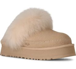 Damskie japonki W DISQUETTE CHALET. Brązowe klapki damskie UGG, bez wzorów, z materiału, eleganckie, bez obcasa. Za 556.20 zł.