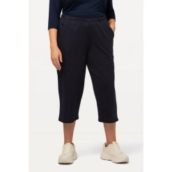Damskie Spodnie dresowe 7/8 prosta nogawka elastyczny ściągacz. Niebieskie spodnie dresowe damskie Ulla Popken, plus size, bez wzorów, z bawełny. Za 123.99 zł.