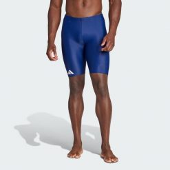 Szorty do pływania Solid. Białe krótkie spodenki sportowe męskie Adidas, xl, bez wzorów, z elastanu, na fitness i siłownię. Za 158.85 zł.