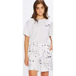 Puma - Top x Shantell Martin. Szare topy damskie Puma, z nadrukiem, z bawełny, z okrągłym kołnierzem, z krótkim rękawem. W wyprzedaży za 139.90 zł.