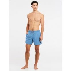 Szorty plażowe Protest Davey. Niebieskie kąpielówki męskie Protest, l, bez wzorów, do pływania. Za 267.00 zł.