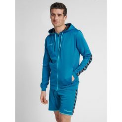 Bluza fitness męska Hummel zip hml AUTHENTIC Poly. Niebieskie bluzy sportowe męskie Hummel, m, bez wzorów, bez kaptura, na fitness i siłownię. W wyprzedaży za 177.00 zł.