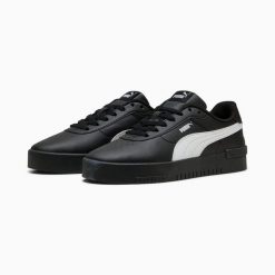 Puma Buty Jola 39841308. Czarne obuwie sportowe damskie Puma, bez wzorów, z gumy, tenisowe. Za 195.57 zł.