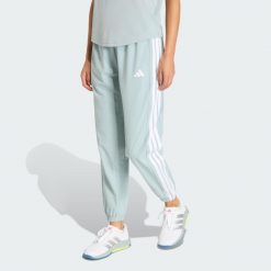 Spodnie Train Essentials 3-Stripes Woven. Białe obuwie sportowe damskie Adidas, bez wzorów, z materiału, na fitness i siłownię, climacool (adidas). Za 219.00 zł.