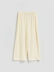 Szerokie spodnie z lyocellu - złamana biel. Spodnie materiałowe damskie Reserved, l, bez wzorów, z lyocellu. Za 119.99 zł.