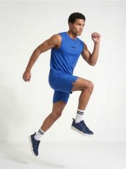 Sportowa koszulka bez rękawów SNSY PERFORMANCE - niebieski. Niebieskie koszulki sportowe męskie Sinsay, l, bez wzorów, bez kołnierzyka, bez ramiączek. Za 25.99 zł.