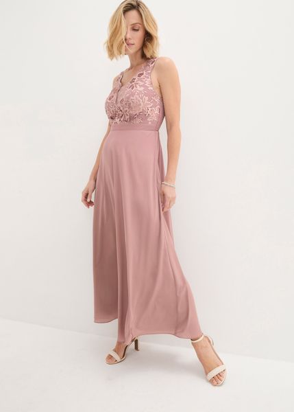 Długa sukienka z aplikacją z cekinów. Czerwone sukienki damskie bonprix, z aplikacjami, eleganckie, bez kołnierzyka, bez ramiączek, maxi. Za 329.99 zł.