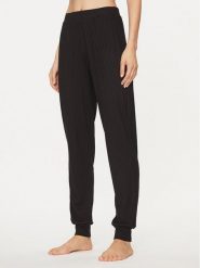 Guess Spodnie dresowe O3BB00 KBXB2 Czarny Regular Fit. Czarne spodnie dresowe damskie Guess, s, z aplikacjami, z dresówki. Za 109.99 zł.