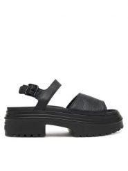 Converse Sandały Chuck Taylor All Star Lugged Heel A12189C Czarny. Czarne sandały damskie Converse, bez wzorów, ze skóry, bez obcasa, na płaskiej podeszwie, bez zapięcia. Za 229.99 zł.