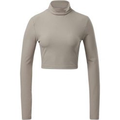 Koszulka sportowa damska Reebok CL WDE Cozy. Brązowe koszulki sportowe damskie Reebok, m, bez wzorów, z elastanu, bez kołnierzyka, bez ramiączek. Za 60.00 zł.