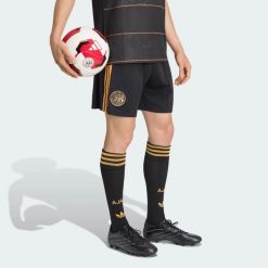 Spodenki wyjazdowe Ajax Amsterdam 26/27. Brązowe krótkie spodenki sportowe męskie Adidas, s, bez wzorów, z materiału, na fitness i siłownię, climacool (adidas). Za 199.00 zł.