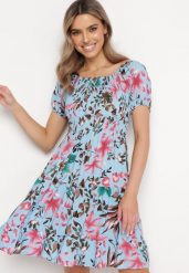 Jasnoniebieska Wiskozowa Sukienka Mini Rozkloszowana w Kwiaty z Falbanką Rilanae. Niebieskie sukienki dla dziewczynek Born2be, bez wzorów, z wiskozy, bez ramiączek. Za 64.99 zł.