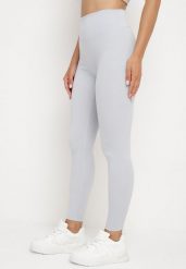 Jasnoniebieskie Legginsy z Wysokim Stanem Parefia. Niebieskie legginsy damskie Born2be, l, bez wzorów, z jeansu, z podwyższonym stanem, na fitness i siłownię. Za 29.99 zł.
