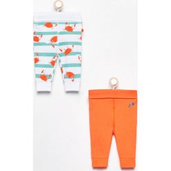 Spodnie 2 pack - Pomarańczo. Spodenki niemowlęce marki Reserved. W wyprzedaży za 19.99 zł.