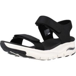 Buty Kobieta Skechers Arch Fit Touristy czarny. Czarne sandały damskie Skechers, bez wzorów, bez obcasa, bez zapięcia. Za 249.99 zł.