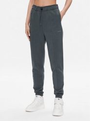 Calvin Klein Performance Spodnie dresowe 00GWS3P605 Zielony Regular Fit. Zielone spodnie dresowe damskie Calvin Klein Performance, m, bez wzorów, z bawełny. Za 369.99 zł.