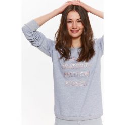 BLUZA DAMSKA NIEROZPINANA Z NADRUKIEM. Bluzy damskie marki TROLL. W wyprzedaży za 49.99 zł.