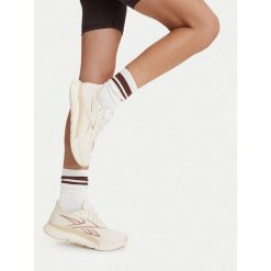 Buty na siłownię Reebok. Białe obuwie sportowe damskie Reebok, bez wzorów, na fitness i siłownię. Za 399.99 zł.