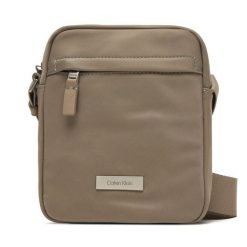 Saszetka Calvin Klein. Brązowe saszetki męskie Calvin Klein, młodzieżowe, małe. Za 299.99 zł.
