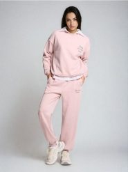 Spodnie jogger z miękkim wnętrzem - różowy. Czerwone spodnie materiałowe damskie Sinsay, l, bez wzorów. Za 29.99 zł.