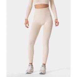 Legginsy bezszwowe Carpatree Allure bezowe. Brązowe legginsy damskie Carpatree, xs, bez wzorów, z materiału, na fitness i siłownię. W wyprzedaży za 169.99 zł.
