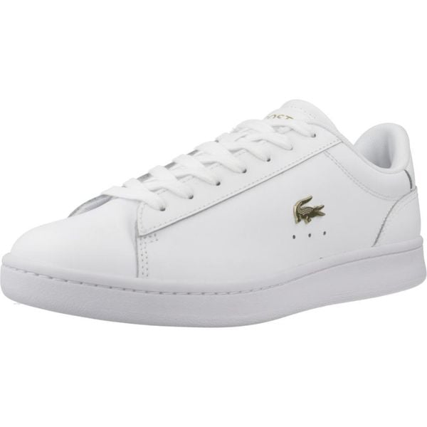 Tenisówki Lacoste Model Carnaby Kolor Biały. Białe obuwie sportowe damskie Lacoste, bez wzorów, ze skóry, bez zapięcia. Za 369.00 zł.