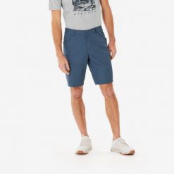 Spodenki turystyczne męskie Quechua NH500 regular. Niebieskie krótkie spodenki sportowe męskie QUECHUA, m, bez wzorów, z bawełny, trekkingowe. Za 89.99 zł.