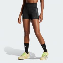 Legginsy Optimé 3-Stripes 1/4 Short. Czarne legginsy damskie Adidas, bez wzorów, z materiału, krótkie, na fitness i siłownię, climacool (adidas). Za 184.85 zł.