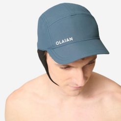 Czapka z daszkiem surfingowa męska Decathlon 100. Niebieskie czapki i kapelusze męskie Decathlon, bez wzorów, z materiału, sportowe. Za 39.99 zł.