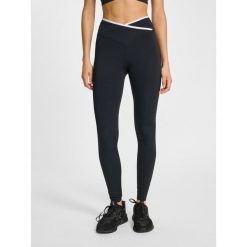 Damskie legginsy z wysokim stanem Hummel Wrap. Czarne legginsy damskie Hummel, bez wzorów, z dresówki. Za 239.50 zł.