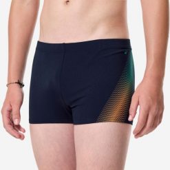 Bokserki pływackie dla dzieci Decathlon Fiti Matrix. Brązowe kąpielówki dla chłopców Decathlon, bez wzorów, z elastanu. Za 39.99 zł.