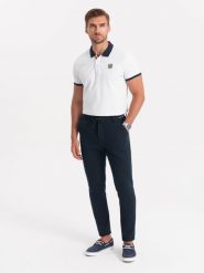 Dzianinowe spodnie męskie z gumką w pasie - granatowe V3 OM-PACP-0116 - XXL. Niebieskie spodnie materiałowe męskie Ombre Clothing, l, bez wzorów, z dzianiny. W wyprzedaży za 149.99 zł.