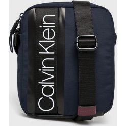 Calvin Klein - Saszetka. Czarne saszetki męskie Calvin Klein, z materiału, casualowe. Za 279.90 zł.