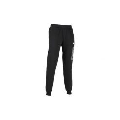 Spodnie dresowe Gym & Pilates regular męskie. Czarne spodnie sportowe męskie Puma, m, bez wzorów, z bawełny, na jogę i pilates. Za 119.99 zł.
