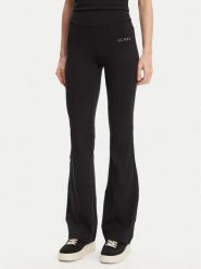 Guess Spodnie dresowe V5RB15 KCD02 Czarny Regular Fit. Czarne spodnie dresowe damskie Guess, s, z aplikacjami, z dresówki. Za 199.99 zł.