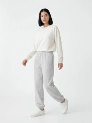 Damskie spodnie dresowe oversize UNLEASH WINGS GREY. Czarne spodnie dresowe damskie Wings, l, bez wzorów, z dresówki. Za 209.90 zł.