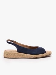 Granatowe wsuwane sandały. Niebieskie sandały damskie Ryłko, bez wzorów, ze skóry, bez obcasa, na koturnie, bez zapięcia. Za 379.99 zł.