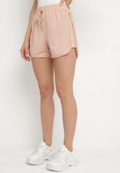 Jasnoróżowe Szorty z Gumką w Pasie i Ozdobnym Sznurkiem Milarisa. Czerwone szorty damskie Born2be, m, bez wzorów, eleganckie. Za 34.99 zł.