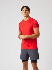 Bjorn_borg BORG T-SHIRT z przetworzonego poliestru FLAME SCARLET. Czerwone t-shirty męskie Björn Borg, m, bez wzorów, z materiału, klasyczne, bez kołnierzyka. Za 196.00 zł.