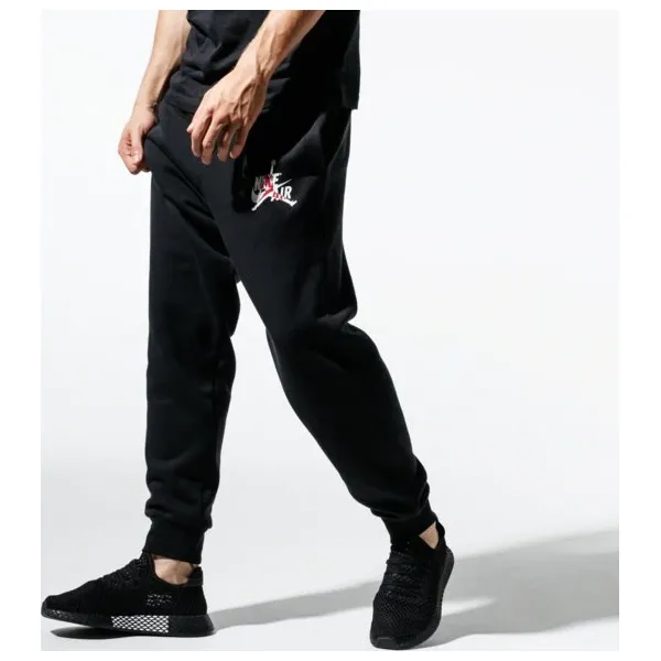Jordan Spodnie M J Jumpman Classics Pant , czarny, rozmiar M. Czarne spodnie sportowe męskie Nike, l, bez wzorów, z bawełny, na fitness i siłownię. Za 279.99 zł.