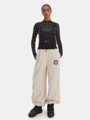 Adidas Ogrodniczki Moon Boot JM1106 Beżowy Loose Fit. Brązowe spodnie materiałowe damskie Adidas, s, bez wzorów, z materiału. Za 439.99 zł.