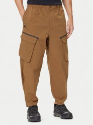 Under Armour Spodnie materiałowe Unstoppable 1388827 Brązowy Loose Fit. Brązowe spodnie materiałowe męskie Under Armour, m, bez wzorów, z materiału. Za 339.99 zł.
