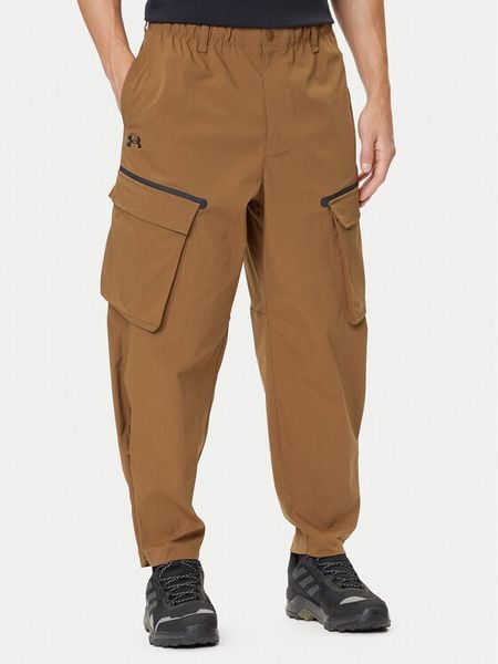 Under Armour Spodnie materiałowe Unstoppable 1388827 Brązowy Loose Fit. Brązowe spodnie materiałowe męskie Under Armour, m, bez wzorów, z materiału. Za 579.99 zł.